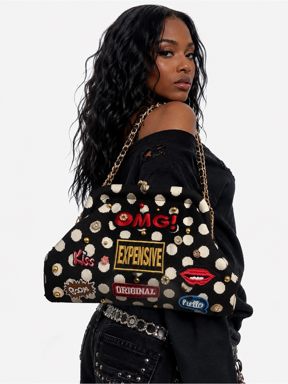 Customize clutch with unique patches that makes this bag of one of one